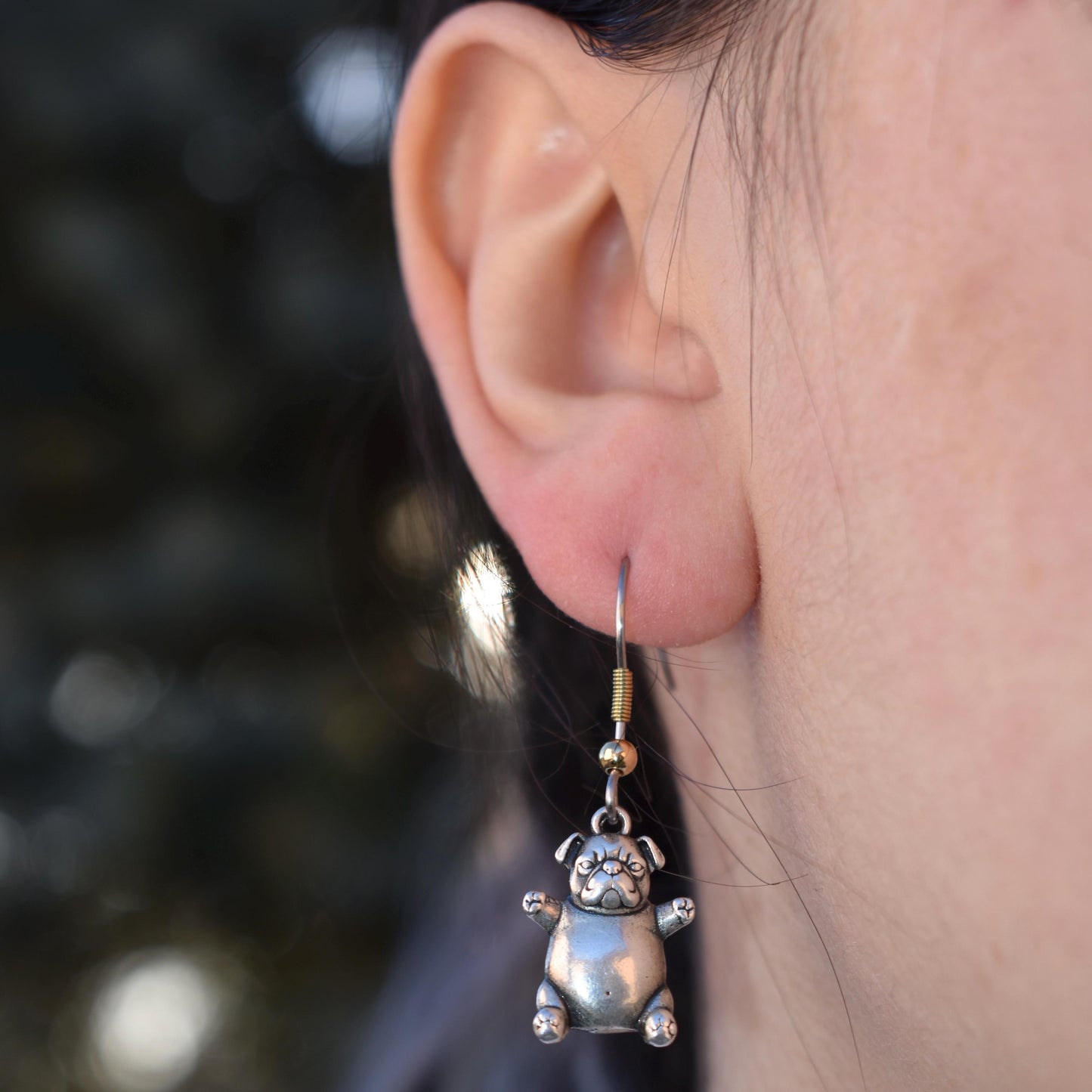 a woman wearing a pibble meme Charm earrings - Handcrafted .925 Sterling Silver Pendant for Bracelets and earrings by The Colorado Charm Company