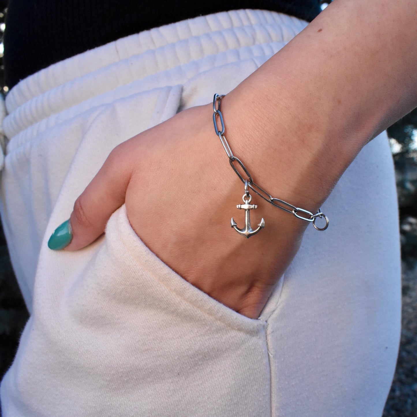 A Woman Wearing A Dainty Anchor Charm on a Bracelet - Handcrafted .925 Sterling Silver Pendant for Bracelets and earrings by The Colorado Charm Company