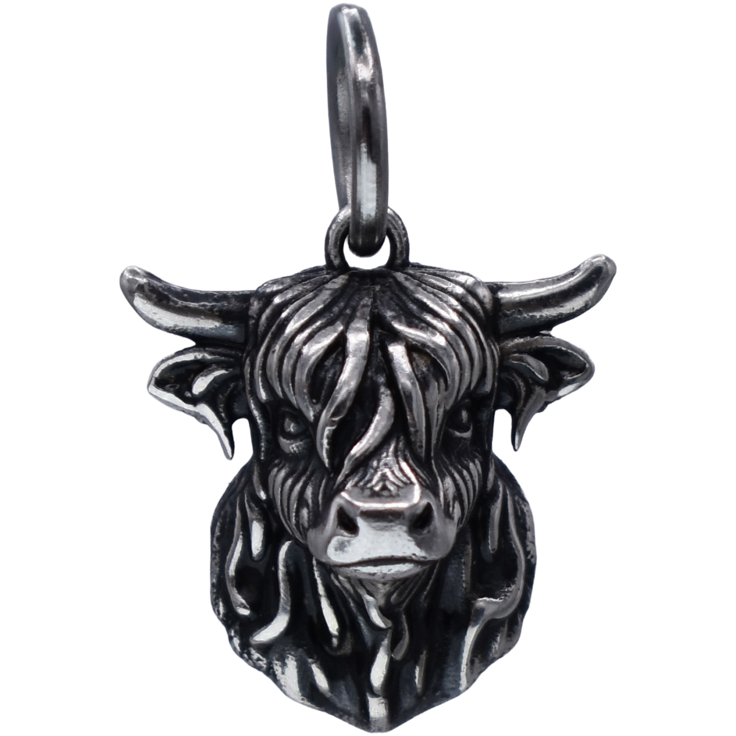 a detailed highland cow Charm - Handcrafted .925 Sterling Silver Pendant for Bracelets and earrings by The Colorado Charm Company - Front view