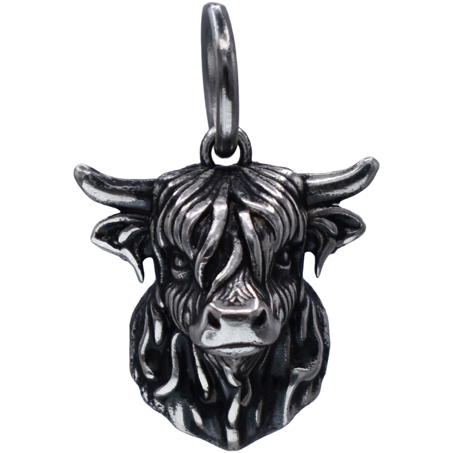 a detailed highland cow Charm - Handcrafted .925 Sterling Silver Pendant for Bracelets and earrings by The Colorado Charm Company - Front view