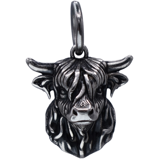 a detailed highland cow Charm - Handcrafted .925 Sterling Silver Pendant for Bracelets and earrings by The Colorado Charm Company - Front view