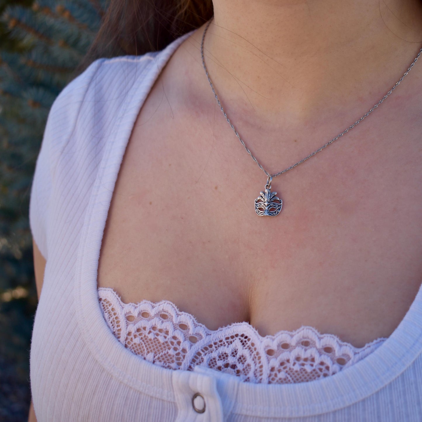 A Woman Wearing Mardi Gras Venetian Mask Charm on a necklace - Handcrafted .925 Sterling Silver Pendant for Bracelets and earrings by The Colorado Charm Company 