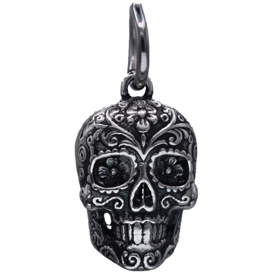 A Dia De Los Muertos Sugar Skull Charm - Handcrafted .925 Sterling Silver Pendant for Bracelets and earrings by The Colorado Charm Company - Front view