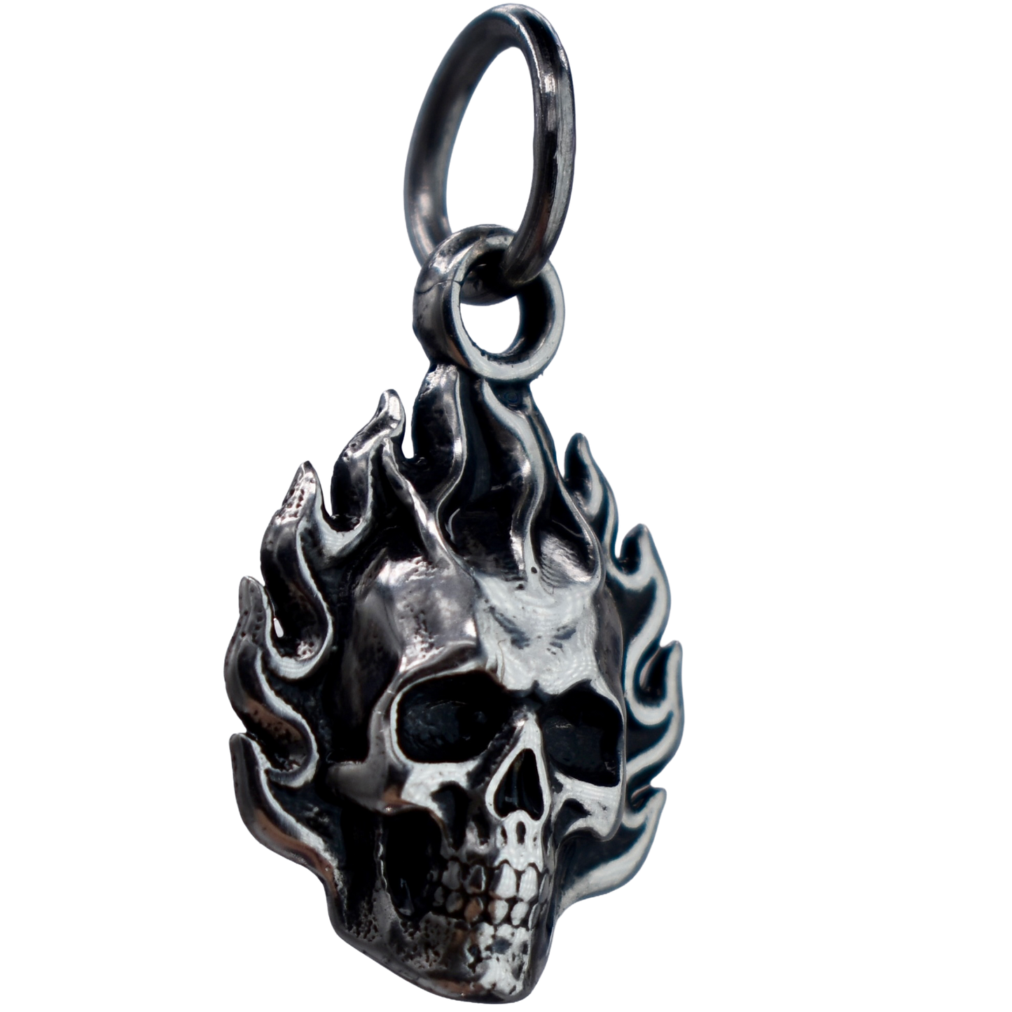 a Flaming Skull Charm - Handcrafted .925 Sterling Silver Pendant for Bracelets and earrings by The Colorado Charm Company - left side view