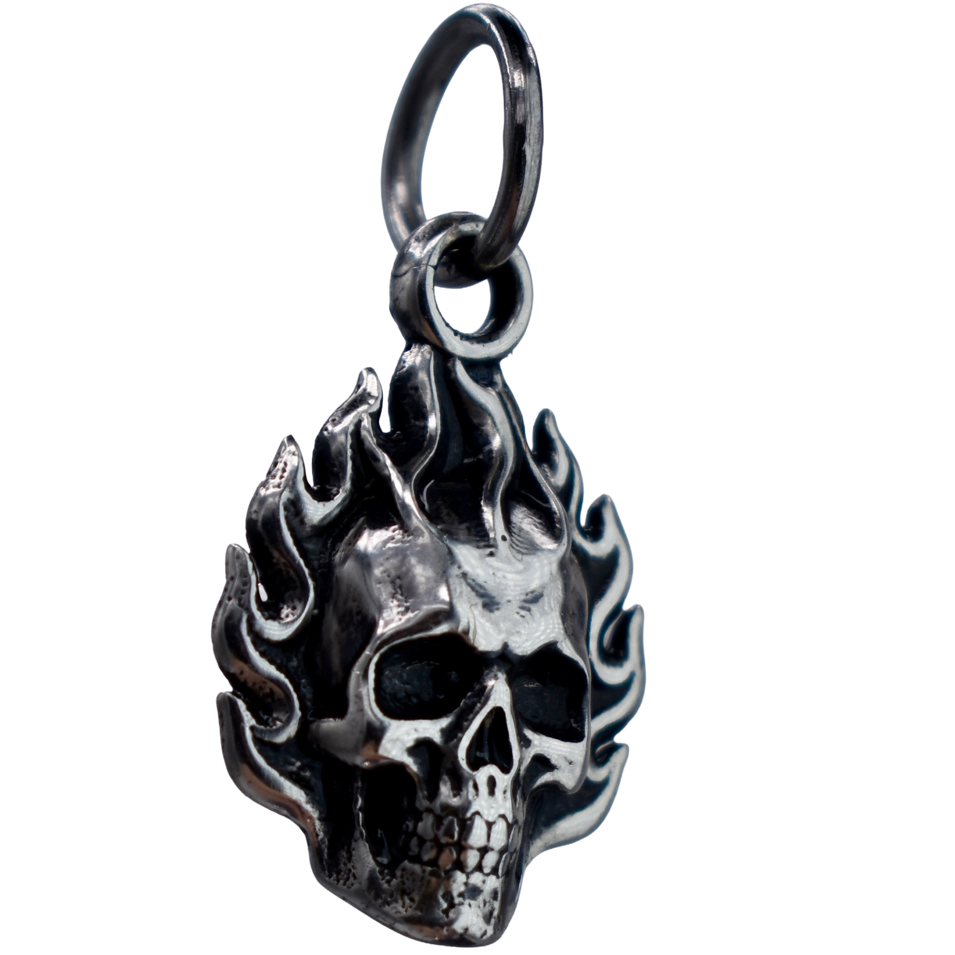 a Flaming Skull Charm - Handcrafted .925 Sterling Silver Pendant for Bracelets and earrings by The Colorado Charm Company - left side view