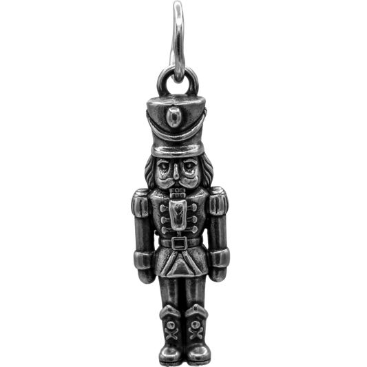 A Classic Nutcracker Charm - Handcrafted .925 Sterling Silver Pendant for Bracelets and earrings by The Colorado Charm Company - front view